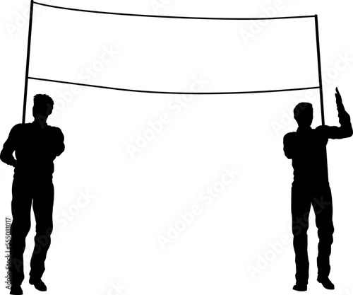 Two protestors or demonstrators at a demonstration march, picket line or strike protest rally in silhouette. Holding up a banner sign.
