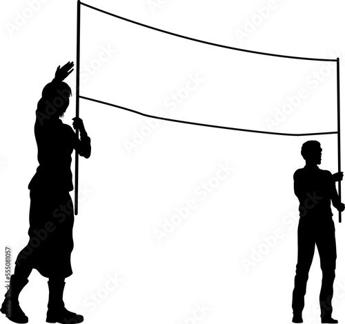 Two protestors or demonstrators at a demonstration march, picket line or strike protest rally in silhouette. Holding up a banner sign.