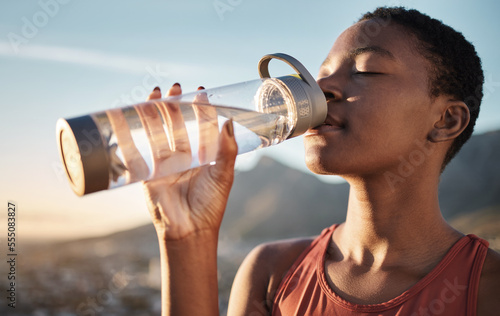 Obraz na płótnie Fitness, black woman and drinking water bottle after training workout, exercise and outdoor cardio running