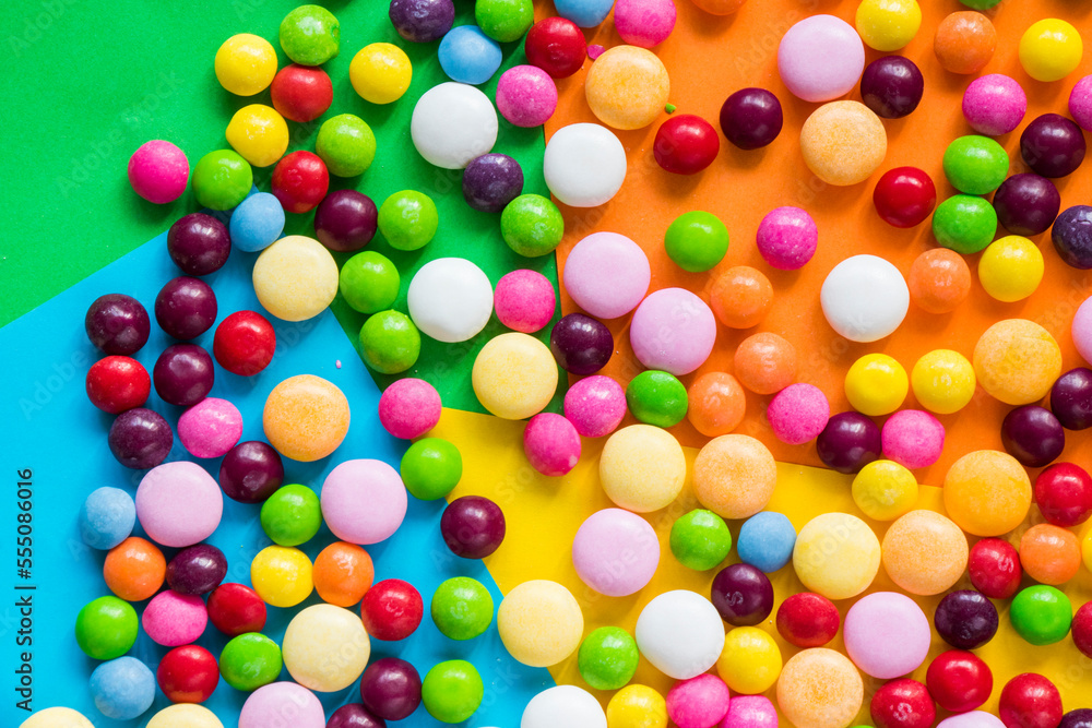 Obraz premium candy on the colorful table, colorful sweet candy