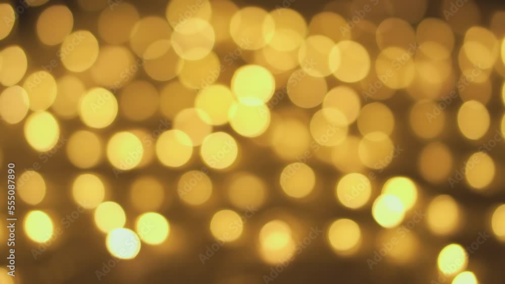 Out of focus holiday background. Light bokeh from Xmas tree. New Year theme, background 4k footage. Christmas lights, shimmering abstract golden warm circles defocused. Blurred fairy lights Out of focus holiday background. Light bokeh from Xmas tree. New Year theme, background 4k footage. Christmas lights, shimmering abstract golden warm circles defocused. Blurred fairy lights