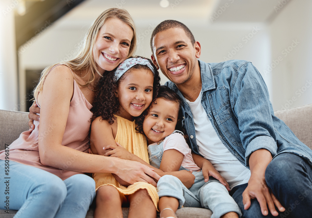 Love, diversity and portrait of happy family hug in rent house living room, bonding and enjoy quality time together. Happiness, child support care and children with mother, father or parents on sofa Love, diversity and portrait of happy family hug in rent house living room, bonding and enjoy quality time together. Happiness, child support care and children with mother, father or parents on sofa