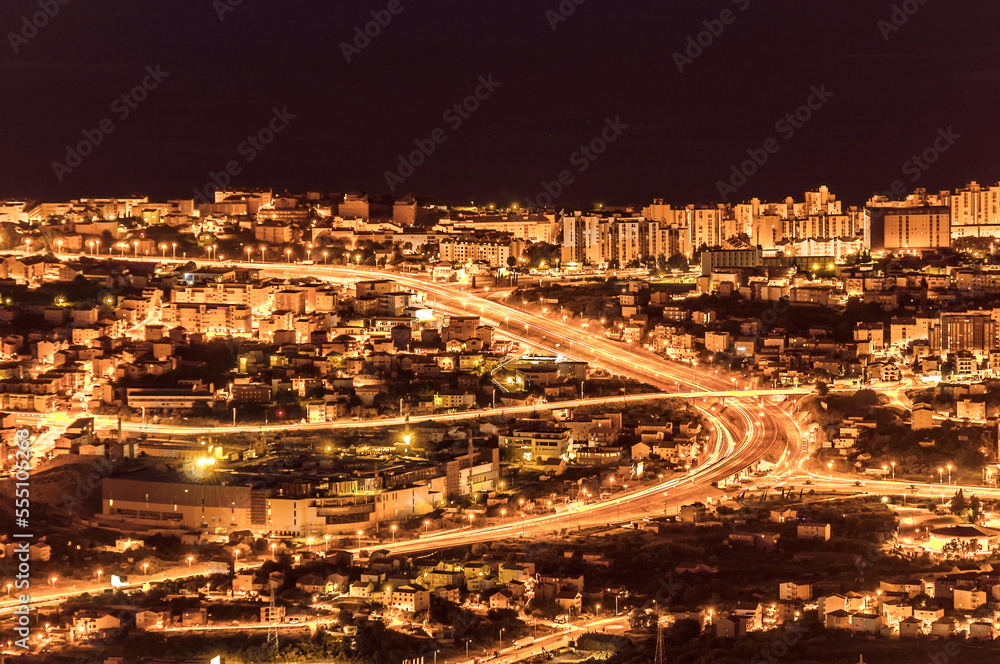 The city of Split, Croatia, Europe, panorama at night, traffic, city lights, road at night