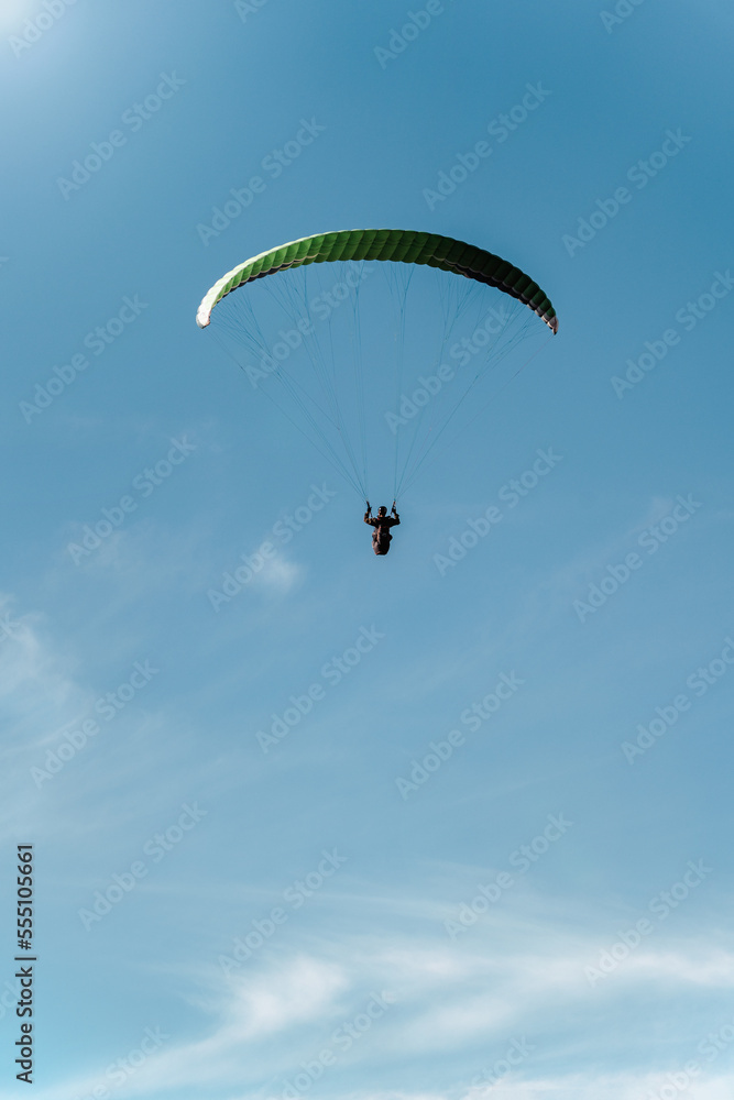 Amazing view of paragliding on the sky with epic sunlight Amazing view of paragliding on the sky with epic sunlight
