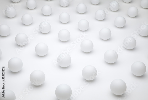 Pattern of white round ping pong balls on a white background representing monotony, uniformity, similarity, traditional values, order, unimaginative and repetitive thinking, or purity and freshness