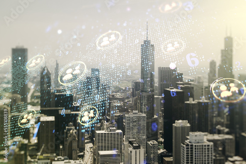 Double exposure of social network icons interface and world map on Chicago office buildings background. Networking concept