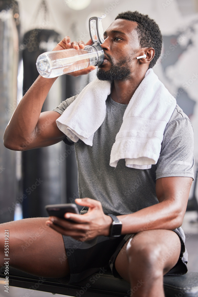 Water bottle, black man in gym and smartphone for social media