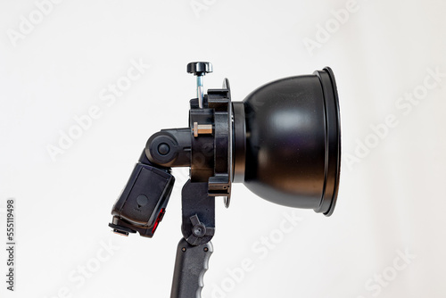 A reflector for photographing complete with a flash on a white background