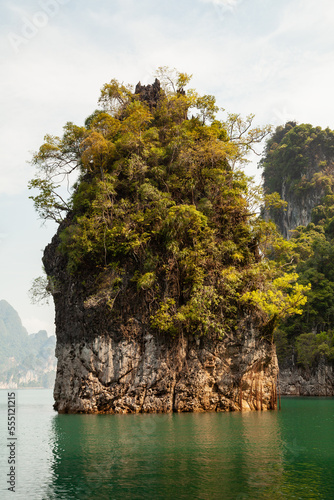 Khao Sam Kloe, a dream place among karst, rainforest-covered mountains at Cheow Lan Lake, Khao Sok National Park, Thailand photo