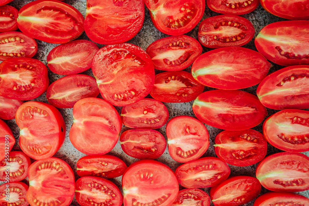 background with delicious red farm cut tomatoes