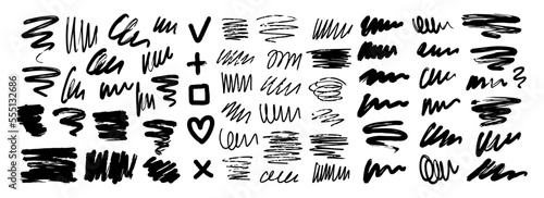 Collection of black abstract brush strokes, lines, signs, squiggles and swirls. Vector hand-drawn illustration isolated on white background. Perfect for decorations and various designs. photo