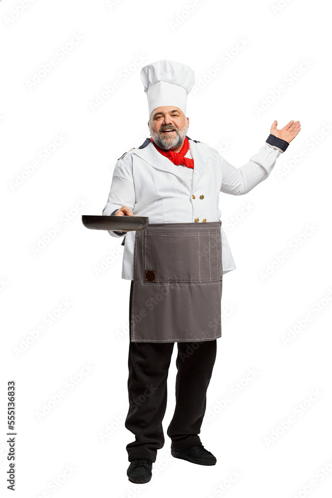 Portrait of bearded man, restaurant chef in uniform posing with frying pan isolated on white background. Cooking Portrait of bearded man, restaurant chef in uniform posing with frying pan isolated on white background. Cooking