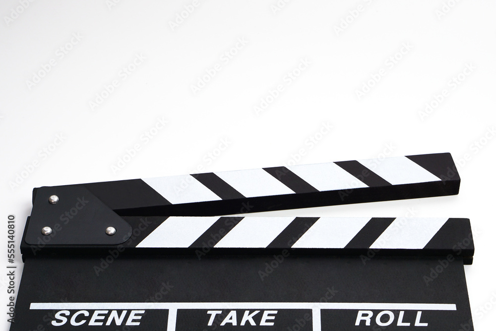 Clapperboard or movie slate black color on white background. Cinema industry, video production and film concept.