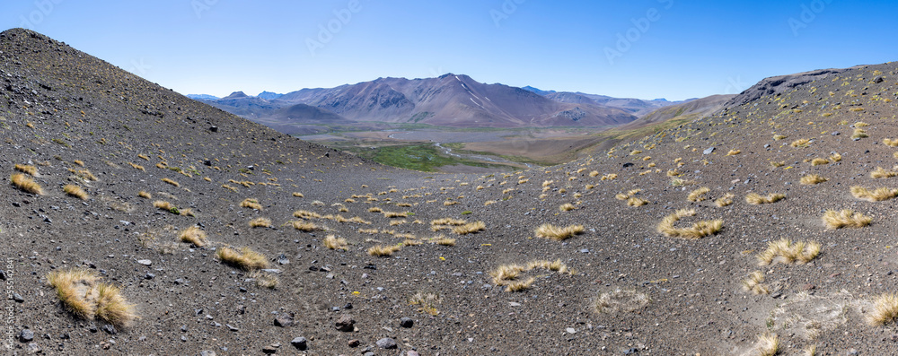 Panorama view of the breathtaking landscape at Paso Vergara / Paso del Planchón in Argentina while climbing up to the complex of the three volcanos Azufre, Peteroa and Planchón
Panorama view of the breathtaking landscape at Paso Vergara / Paso del Planchón in Argentina while climbing up to the complex of the three volcanos Azufre, Peteroa and Planchón