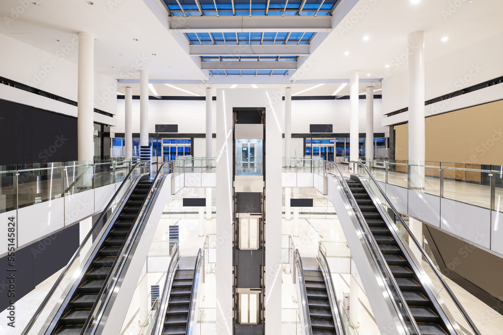 Fototapeta premium Several escalators and elevator of a shopping center