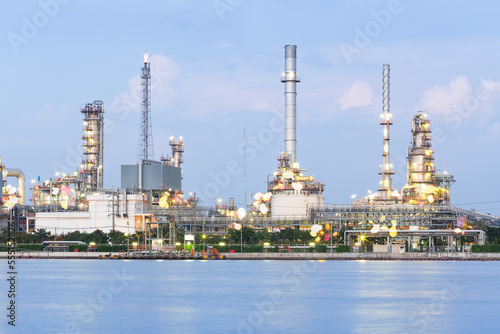 Oil gas refinery plant. May called petroleum, production or petrochemical plant. Industrial factory construction from engineering technology with steel pipe, pipeline, tank. Business for power energy.