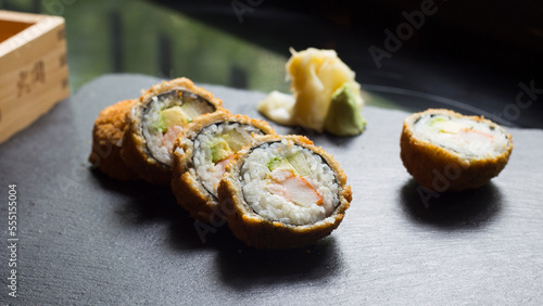 Surimi sushi hot roll. Sushi roll fried. photo