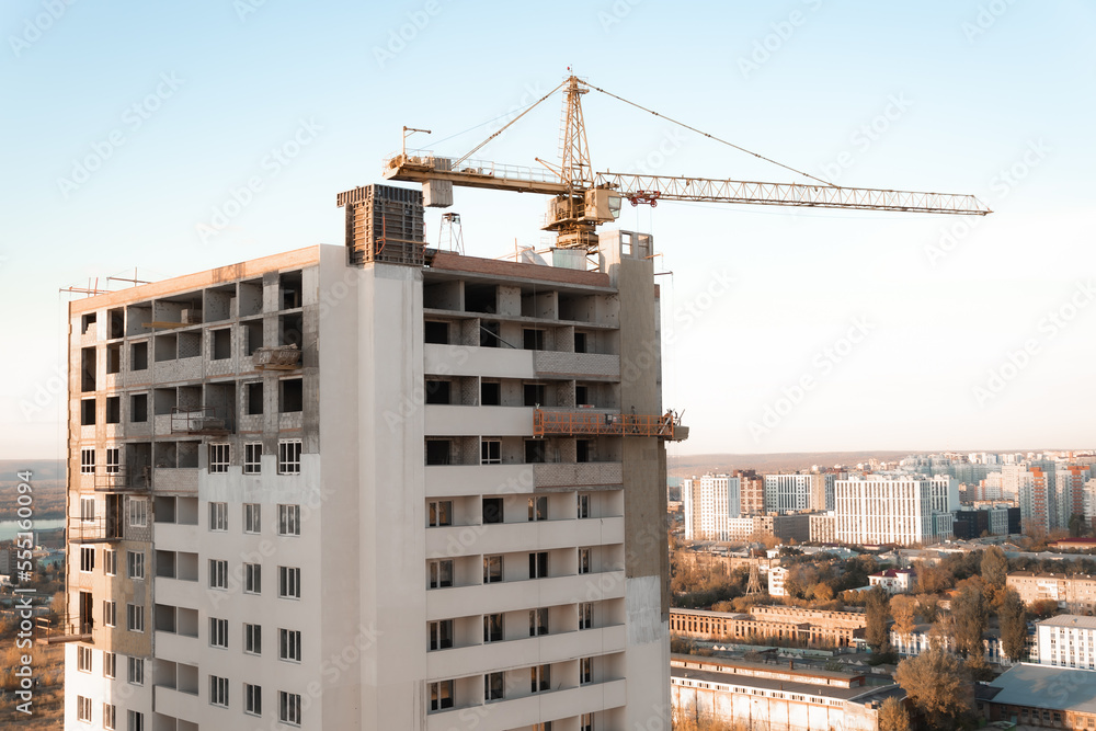 work industrial climber construction facade building painting outer part facade residential building through cradle office high-rise multi-storey building panoramic view construction site russia samar