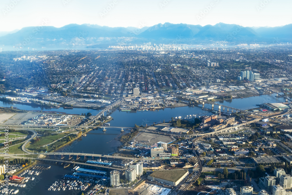 Cityscape of Vancouver with it's waterways, bridges and harbours, and downtown in the distance; Vancouver, British Columbia, Canada Cityscape of Vancouver with it's waterways, bridges and harbours, and downtown in the distance; Vancouver, British Columbia, Canada