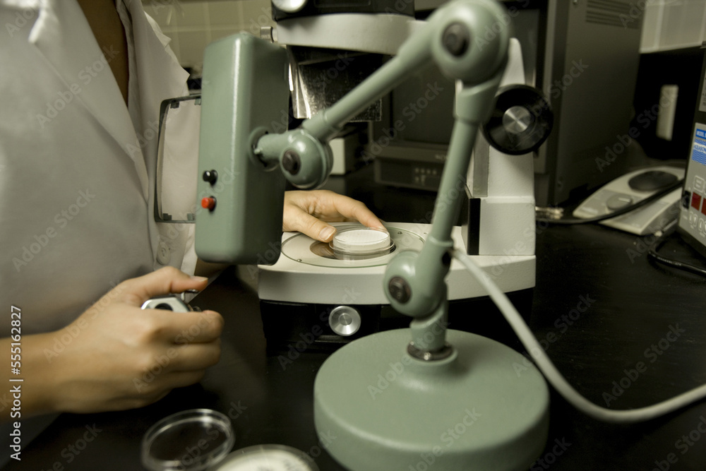 Scientist performing a bacteria count, Membrane filtration method, laboratory Scientist performing a bacteria count, Membrane filtration method, laboratory