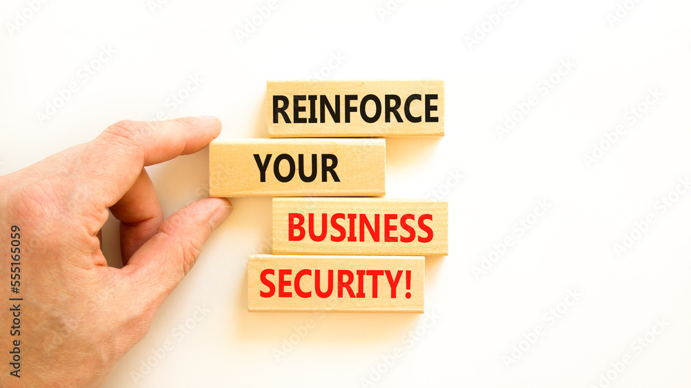 Reinforce your business security symbol. Concept word Reinforce your business security on blocks. Beautiful white table white background. Business reinforce your business security concept. Copy space. Reinforce your business security symbol. Concept word Reinforce your business security on blocks. Beautiful white table white background. Business reinforce your business security concept. Copy space.
