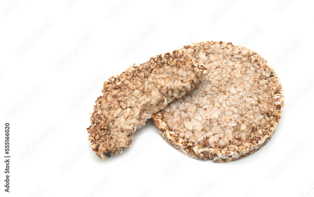 Crispy buckwheat flakes on a white background. Crispy buckwheat flakes on a white background.