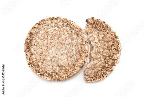 Crispy buckwheat flakes on a white background.