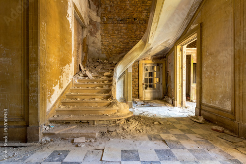 Old abandoned building with the decayed stairs
