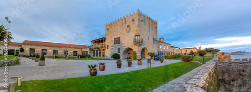 Baiona, Spain - December 05, 2022: Parador Nacional hotel in an old castle on Mount Boien the town of Baiona, Galicia, Spain photo
