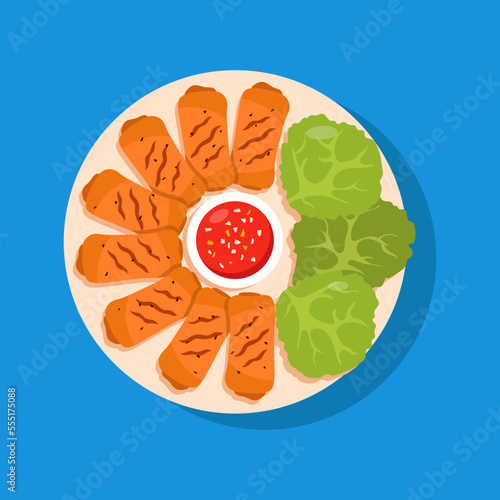 Vietnamese egg rolls or fried spring rolls with sauce. Nem ran isolated on blue background.