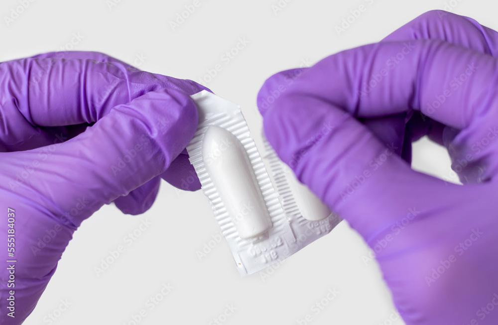 doctor hand in surgical gloves holding detach one anal or vaginal