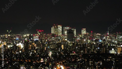 Wallpaper Mural NAGOYA, JAPAN- OCT 2022 : Aerial high angle view of NAGOYA CITY at night. Buildings and street traffic around Nagoya station and Sakae area (central downtown). Time lapse shot. Travel concept video. Torontodigital.ca