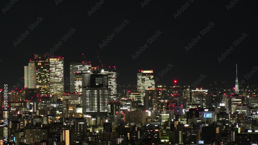 NAGOYA, JAPAN- OCT 2022 : NAGOYA CITY at night. Aerial high angle view of buildings and street traffic around Nagoya station and Sakae area (central downtown). Time lapse shot. Travel concept video. NAGOYA, JAPAN- OCT 2022 : NAGOYA CITY at night. Aerial high angle view of buildings and street traffic around Nagoya station and Sakae area (central downtown). Time lapse shot. Travel concept video.