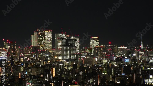 Wallpaper Mural NAGOYA, JAPAN- OCT 2022 : Aerial high angle view of NAGOYA CITY at night. Buildings and street traffic around Nagoya station and Sakae area (central downtown). Time lapse shot. Travel concept video. Torontodigital.ca