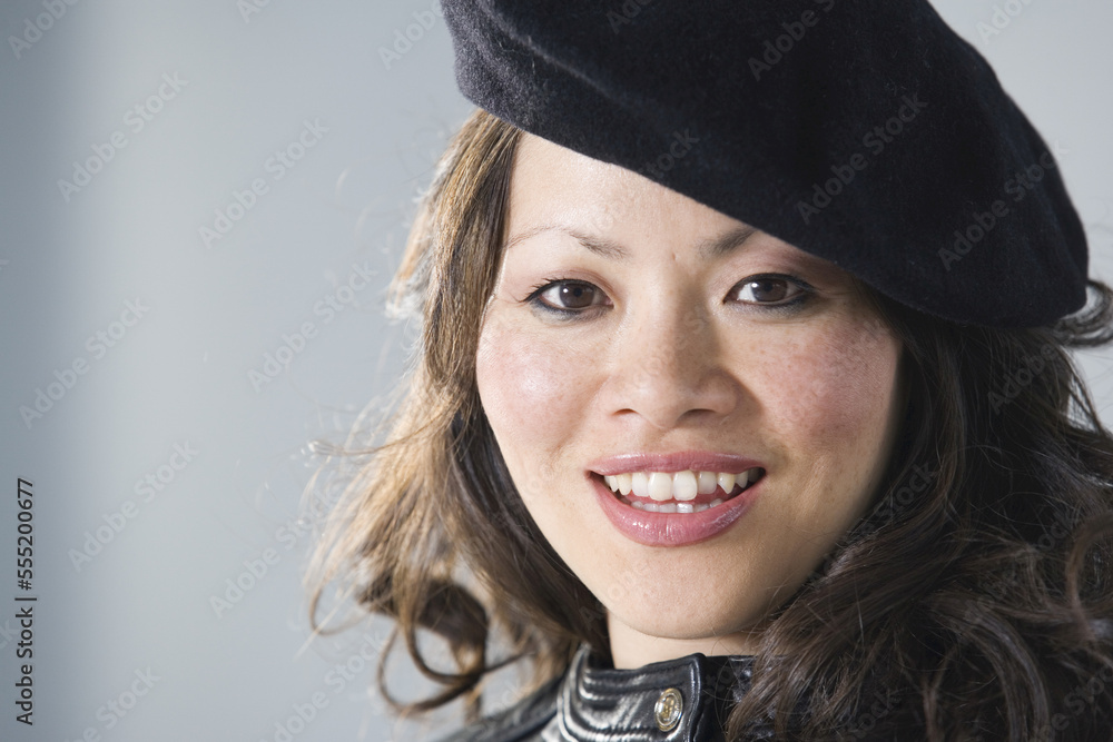 Close up of a mid adult woman smiling. Close up of a mid adult woman smiling.