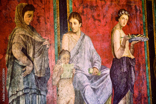 detail of the ancient painting in the Villa of the Mysteries in Pompeii. Pompeii was destroyed by the volcanic eruption of Vesuvius in 79 BC © BlackMac