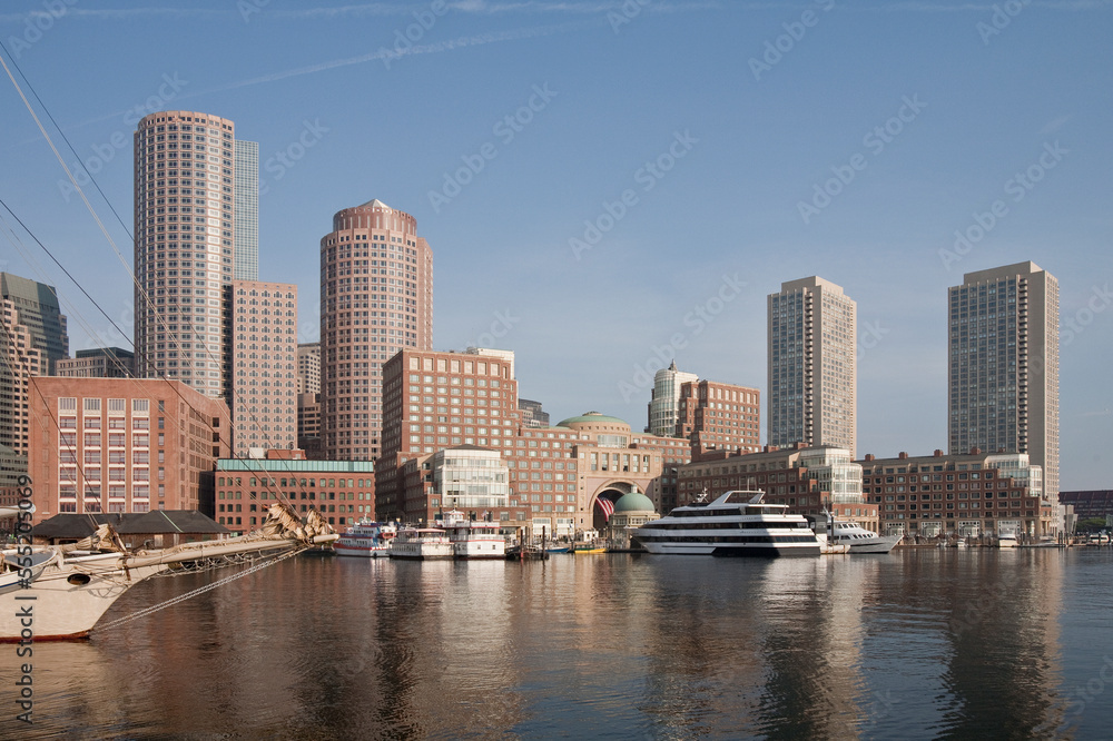 Boats with financial district on a harbor, Rowes Wharf, Boston Harbor, Boston, Massachusetts, USA Boats with financial district on a harbor, Rowes Wharf, Boston Harbor, Boston, Massachusetts, USA