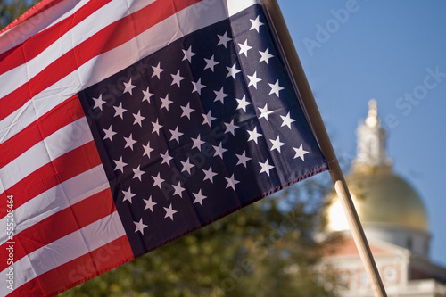 Upside down American flag for protest march, Massachusetts State House, Boston, Massachusetts, USA photo