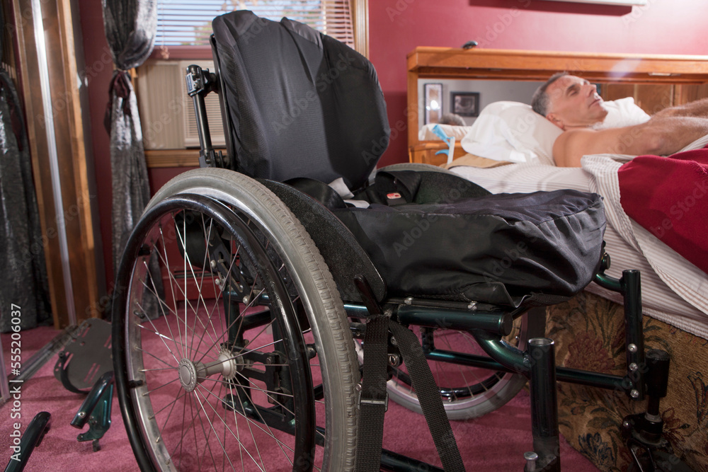 Man with spinal cord injury sleeping on the bed Stock Photo Adobe Stock