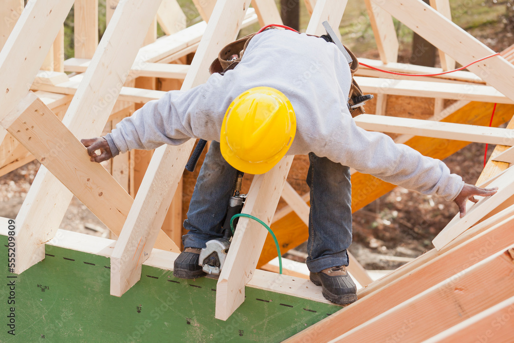 Carpenter lifting rafter for dormer Carpenter lifting rafter for dormer