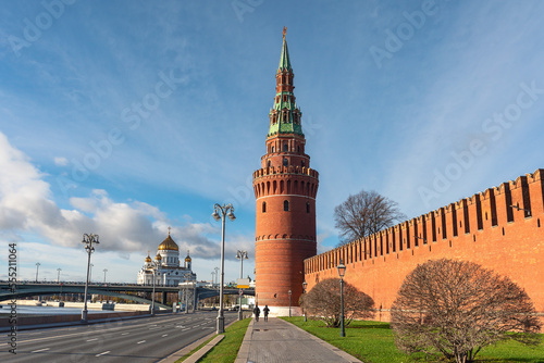 Vodovzvodnaya tower of the Moscow Kremlin with the Church of the Nativity in the background. Moscow, Russia. Architecture and sights of the Russian capital photo