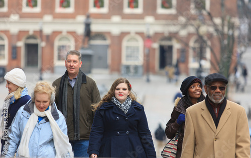 Tourists walking in front of Faneuil Hall Plaza, Boston, Suffolk County, Massachusetts, USA photo