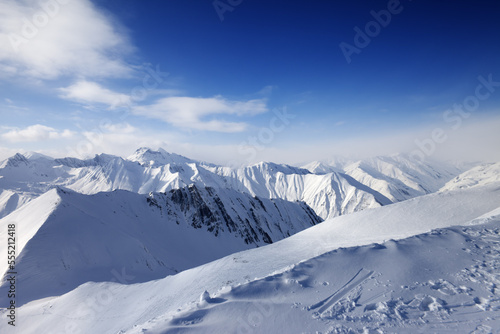 Snowy mountains and blue sky