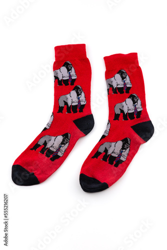 Pair of red socks with monkeys