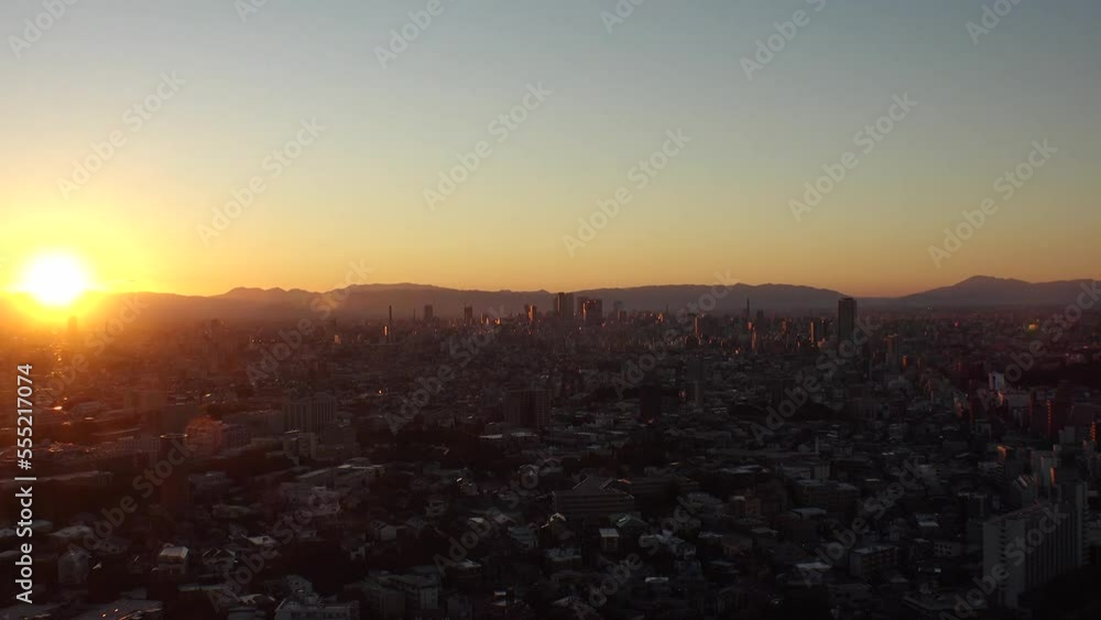 NAGOYA, JAPAN - OCT 2022 : Aerial high angle view of NAGOYA CITY in sunset. View of buildings and street traffic around Nagoya station and Sakae area (central downtown). Time lapse shot, dusk to night NAGOYA, JAPAN - OCT 2022 : Aerial high angle view of NAGOYA CITY in sunset. View of buildings and street traffic around Nagoya station and Sakae area (central downtown). Time lapse shot, dusk to night