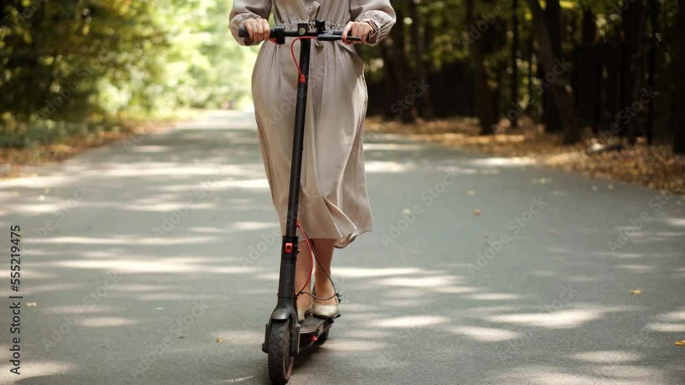 commuting on electric scooter. commuter on kick scooter zero emission