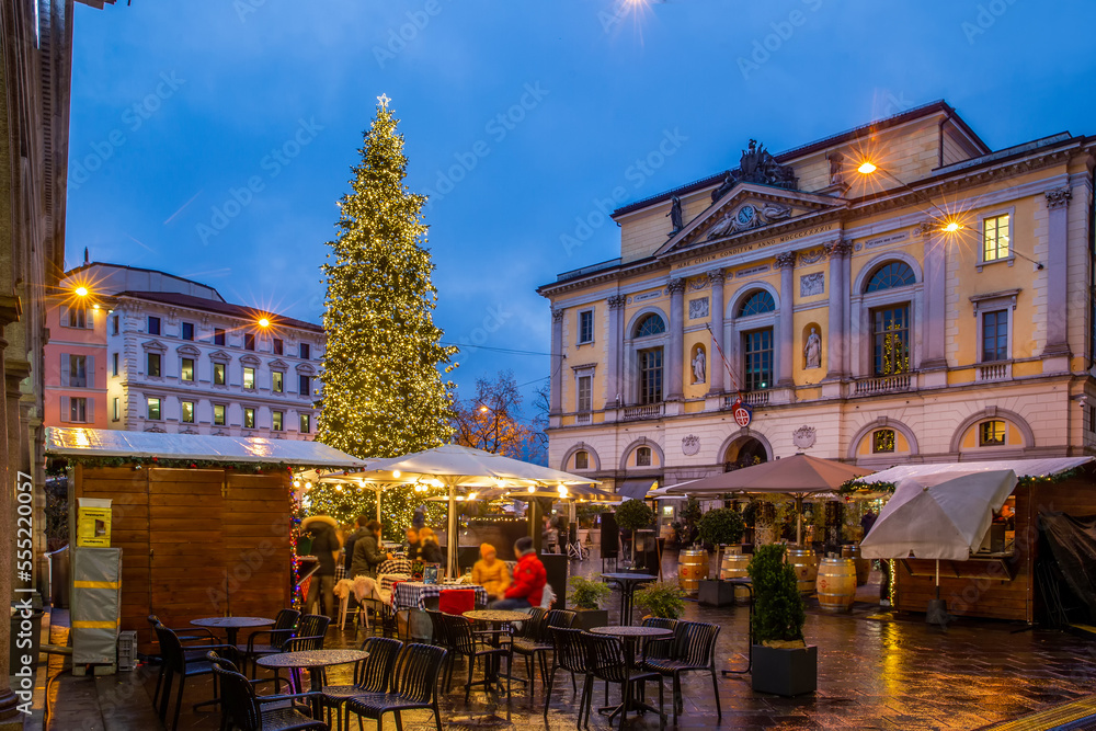 Christmas tree  and  behind  The building of the Municipality of the City of Lugano