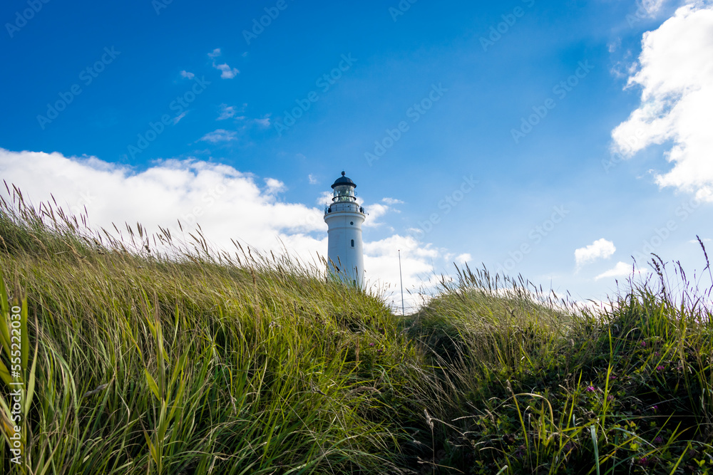 Fototapeta premium An old white lighthouse in Frederikshavn, hritshals, Denmark build during World War