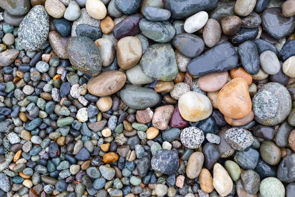 Colourful rocks in various sizes on shore; British Columbia, Canada Colourful rocks in various sizes on shore; British Columbia, Canada