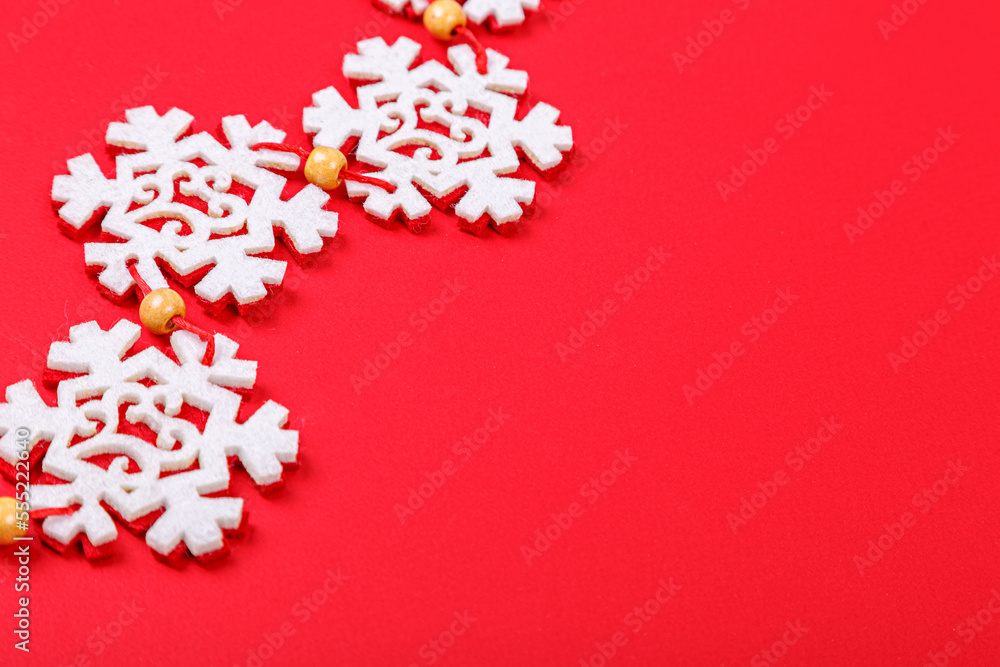 Christmas garland on a red background Christmas garland on a red background
